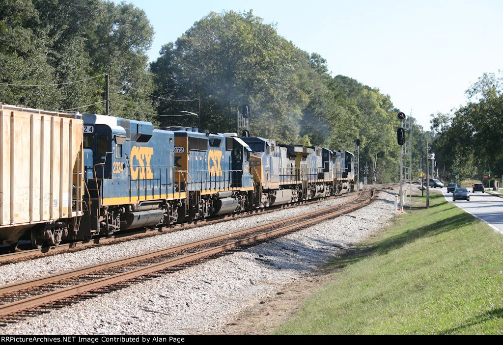 CSX 7791, 33, 94, 6472, and 2324 head SB past the Union City signals
